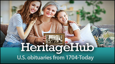 Three women of different generations sit on a couch, smiling and holding an old family photo; text reads "HeritageHub: U.S. obituaries from 1704-Today.