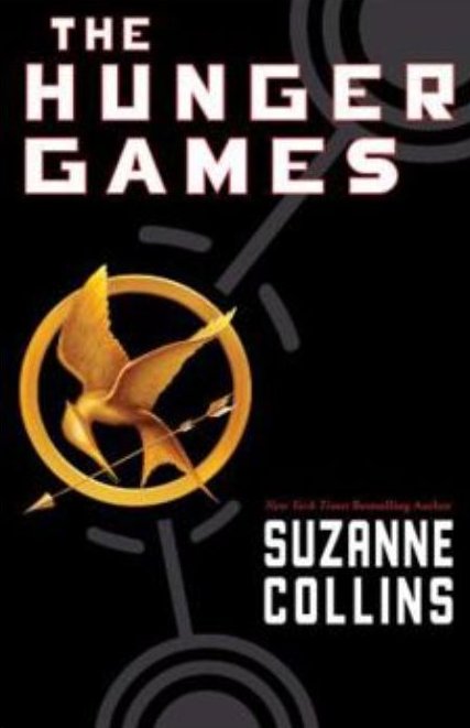 Book cover of "The Hunger Games" by Suzanne Collins, featuring a gold mockingjay pin with an arrow on a black background with white and red text.