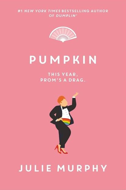 Book cover for "Pumpkin" by Julie Murphy, featuring a person in a tuxedo with a rainbow belt and red heels striking a pose on a pink background. The tagline reads, "This year, prom's a drag.